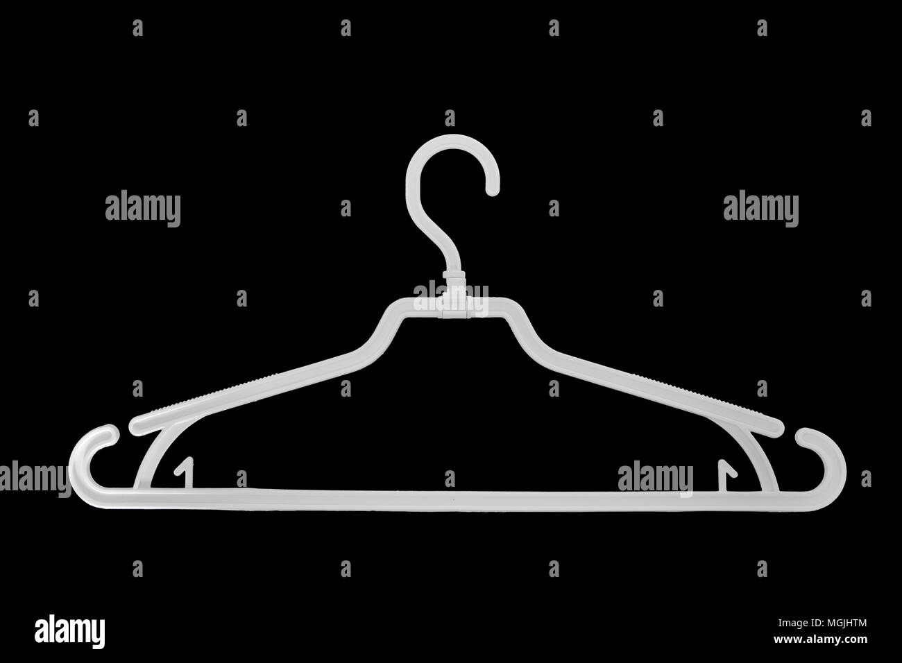 Cheap plactic cloth hanger. Equipment for Dry Cleaning and Laundry Service Stock Photo