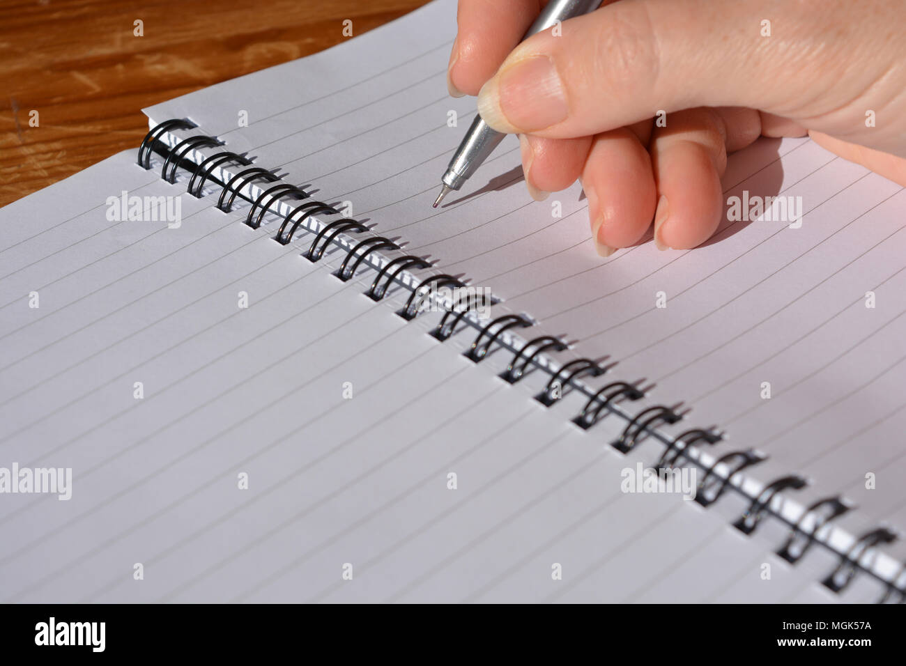 Spiral notebook with writing hi-res stock photography and images - Alamy