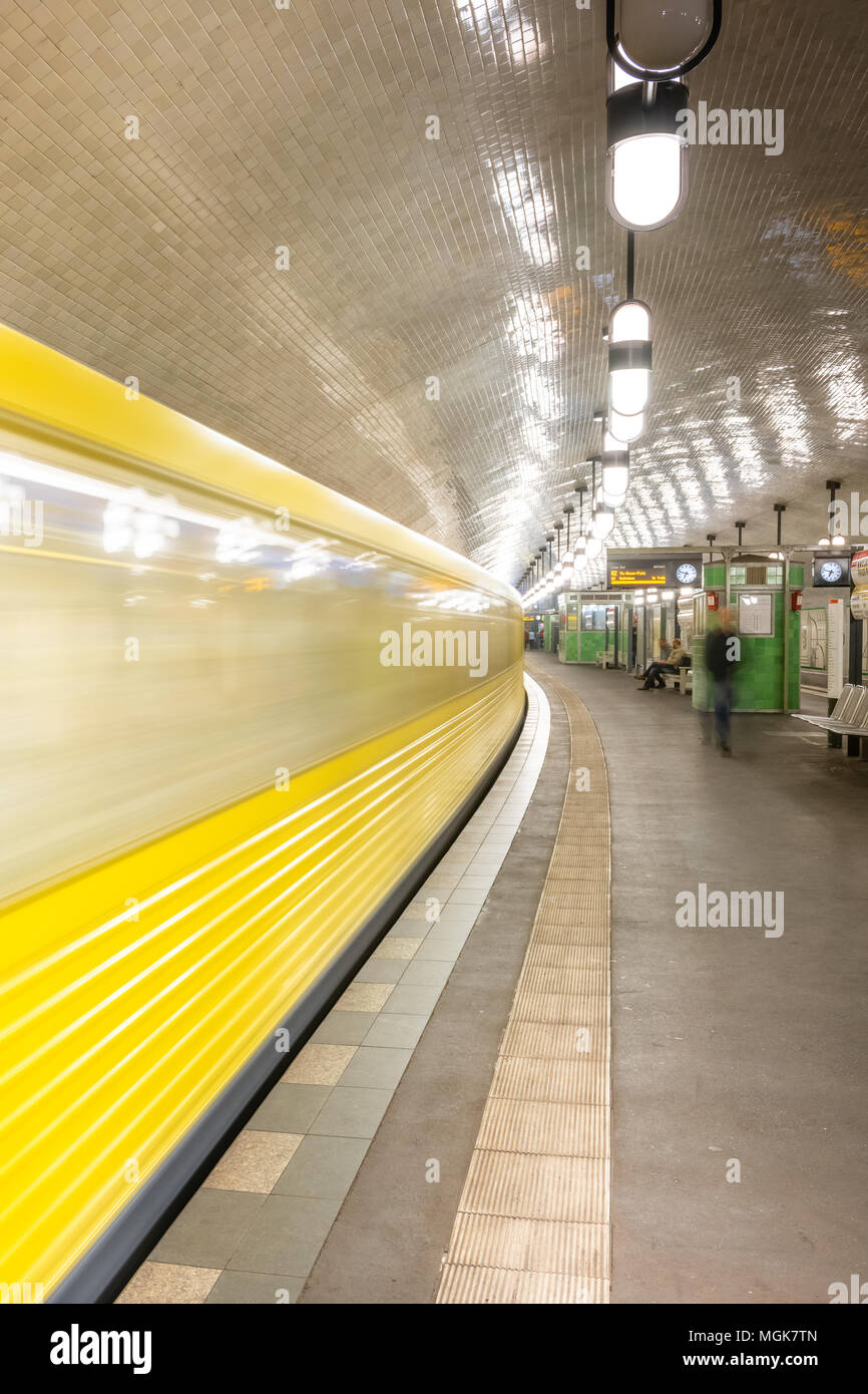 Early morning commuters depart one of the frequent metro (U-Bahn) trains at Märkisches Museum in the centre of the German capital of Berlin. Stock Photo