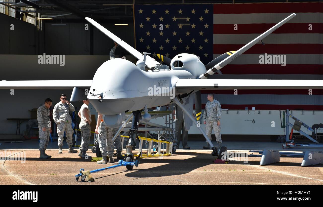 An Air Force MQ-9 Reaper drone undergoing maintenance in a hangar at Columbus Air Force Base, MS. Stock Photo