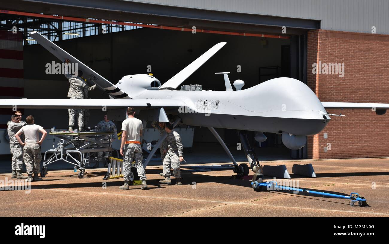 An Air Force MQ-9 Reaper drone undergoing maintenance in a hangar at Columbus Air Force Base, MS. Stock Photo