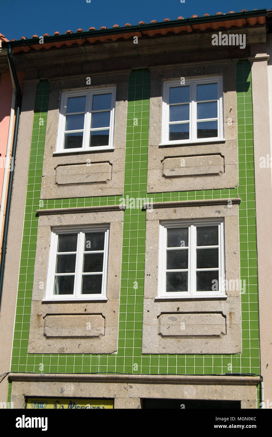 Historic center facades with ceramic tiles in Portugal, city of Braga make remember the past famylies how lives there. Stock Photo