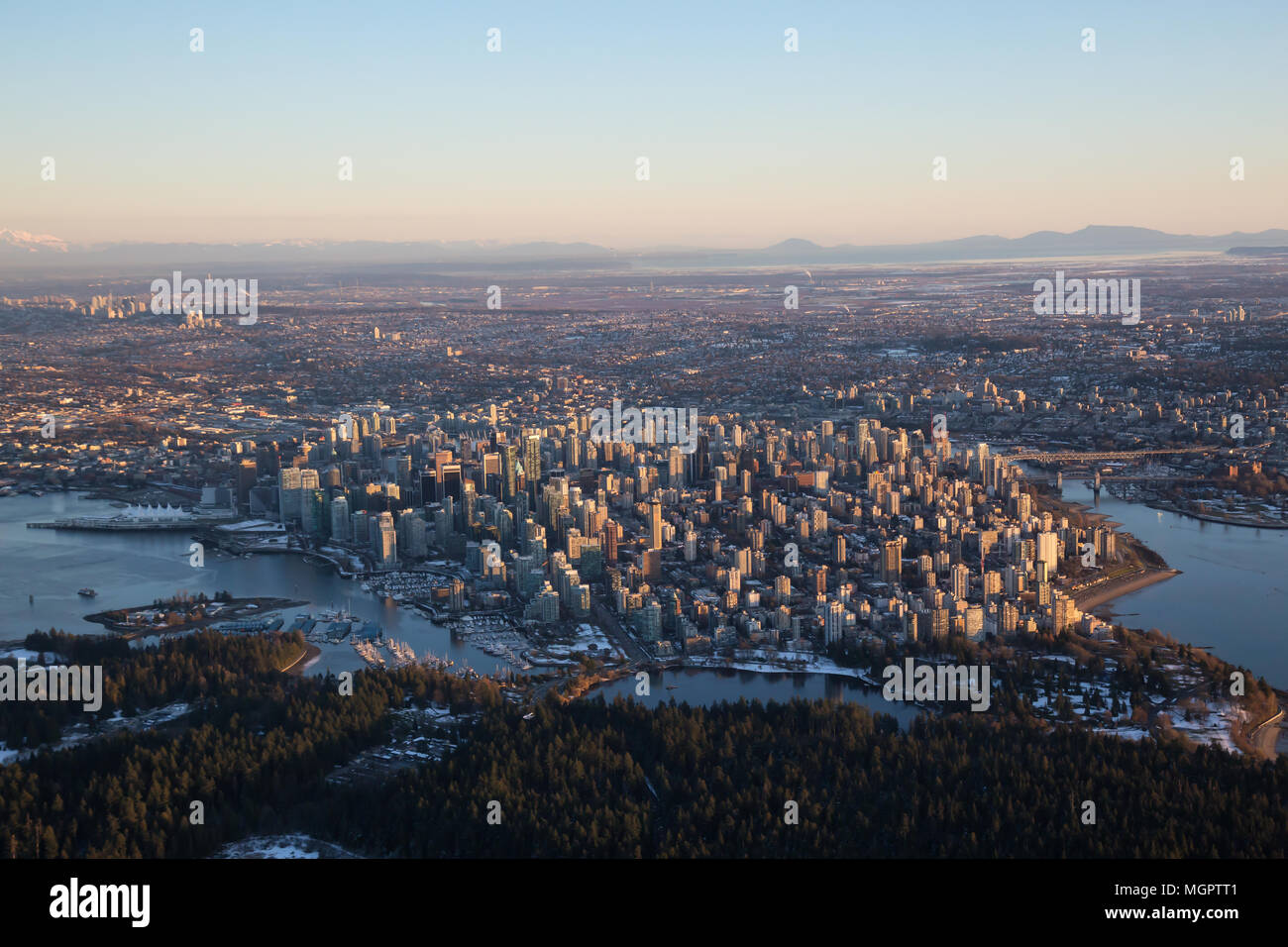 Aerial view of Downtown City during a vibrant sunset. Taken in ...