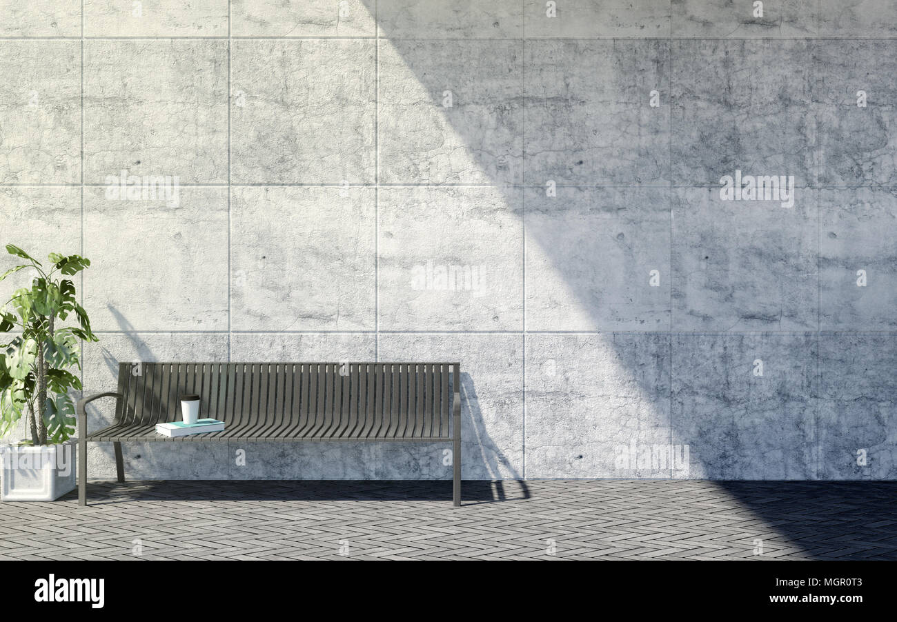 Metal Outdoor Bench With Decorative Plants On Bright Concrete Wall
