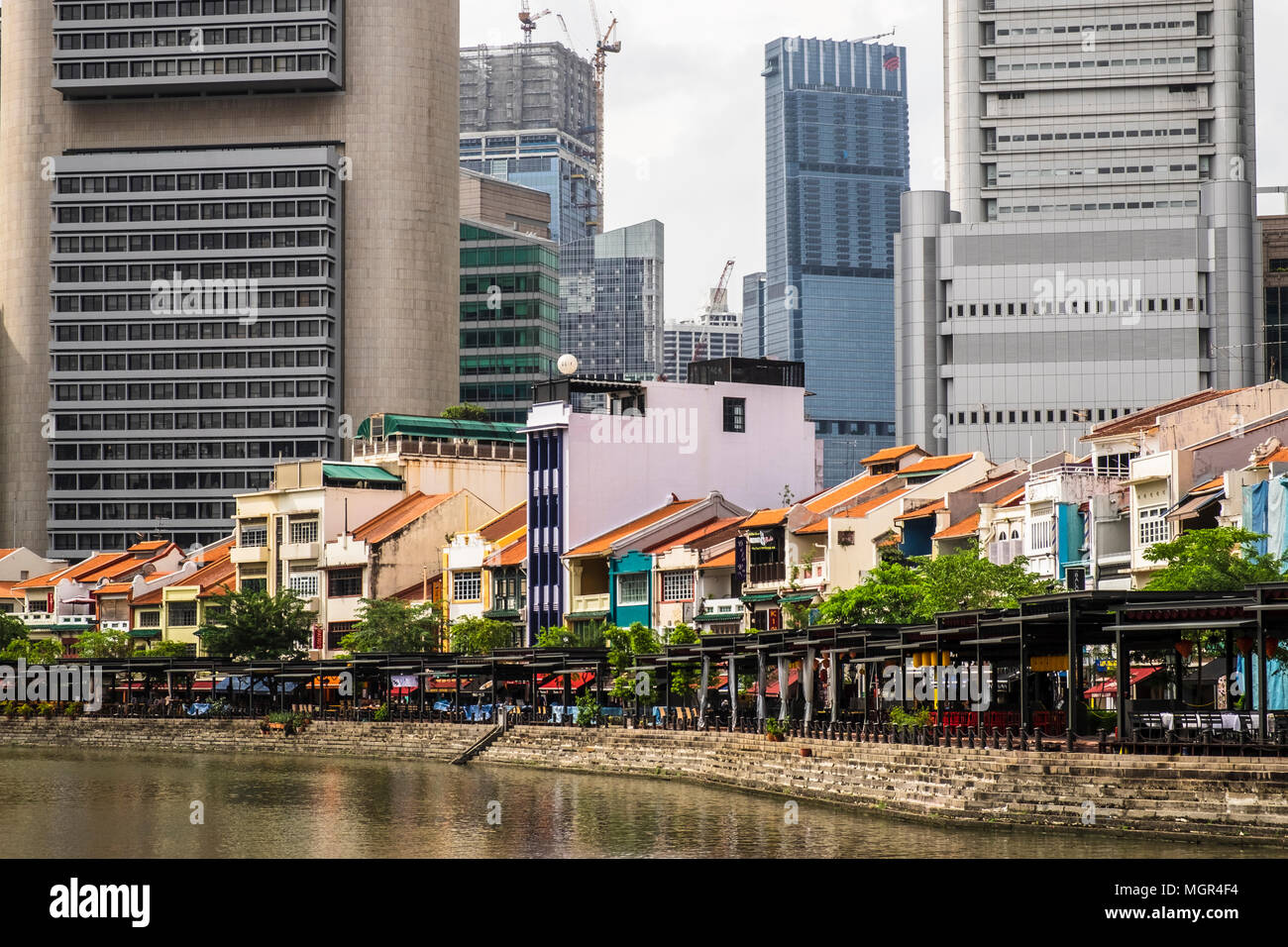View of Boat Quay across Singapore River, Singapore Stock Photo