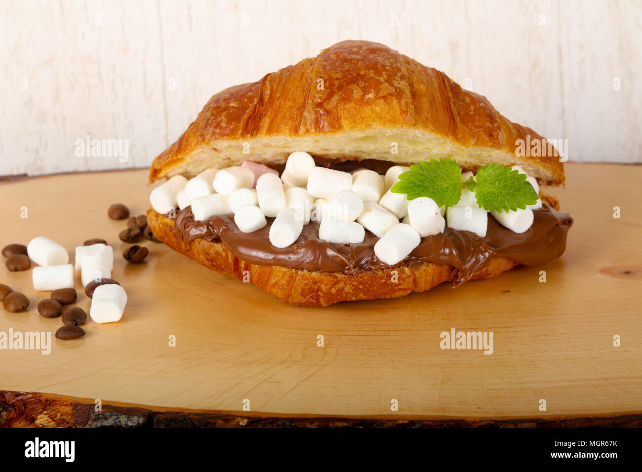 Croissant with marshmallow and chocolate Stock Photo Alamy