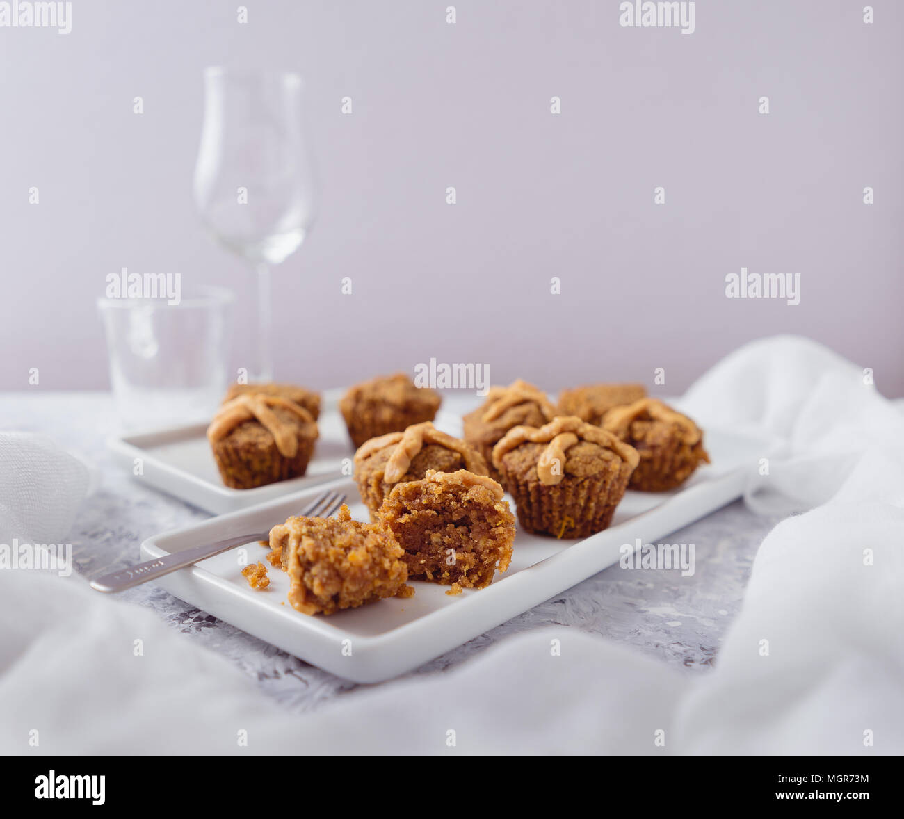 Hot Cross Muffins for Easter, brightly lit table scene Stock Photo