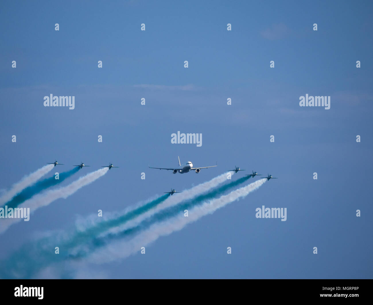 Airplanes in formation during an airshow Stock Photo - Alamy