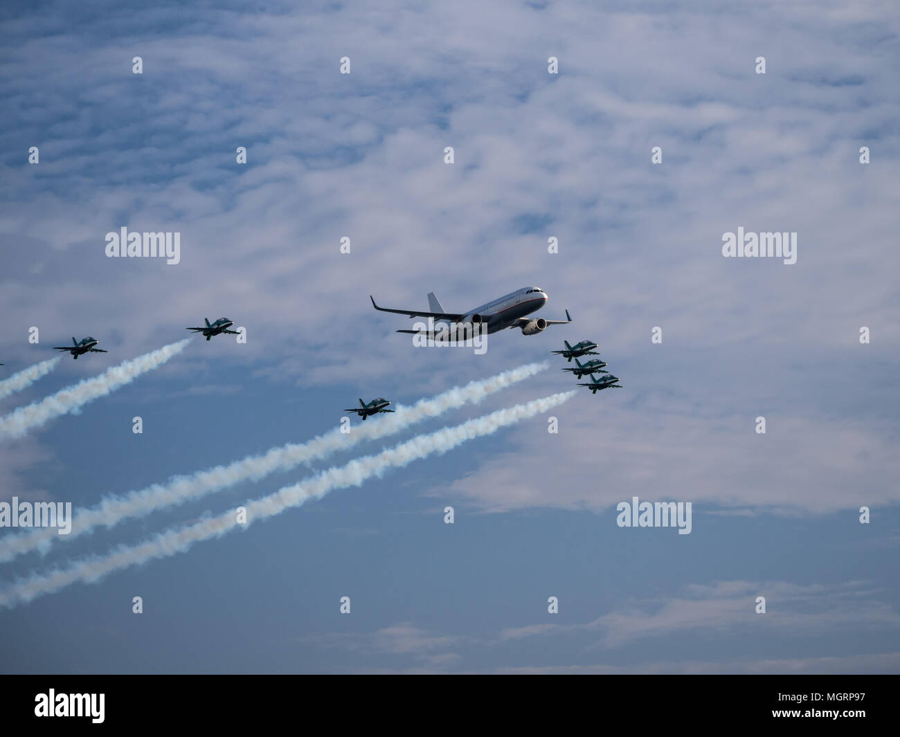 Airplanes in formation during an airshow Stock Photo - Alamy