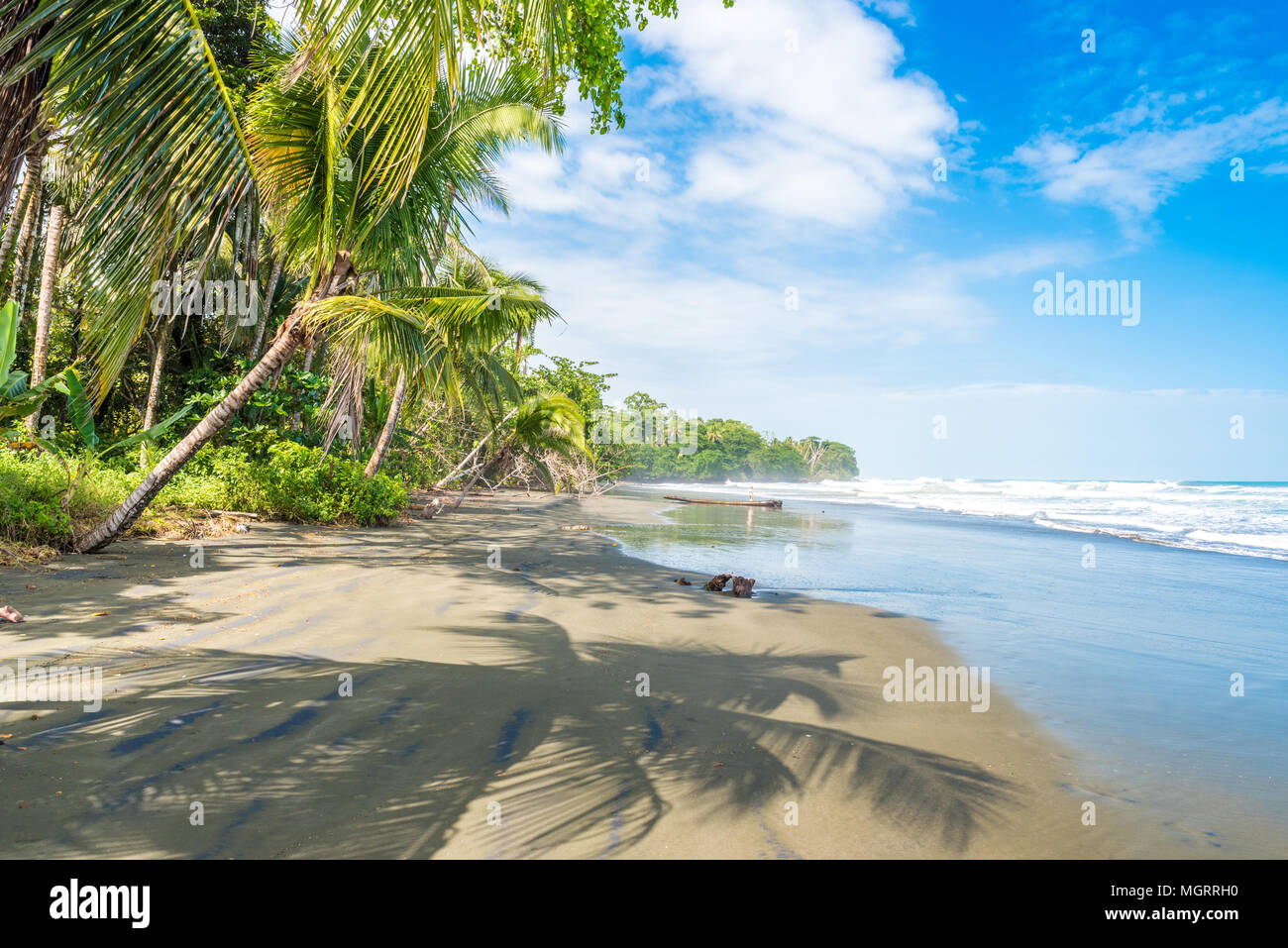 Playa Negra - black beach at Cahuita, Limon - Costa Rica - tropical and  paradise beaches at caribbean coast Stock Photo - Alamy