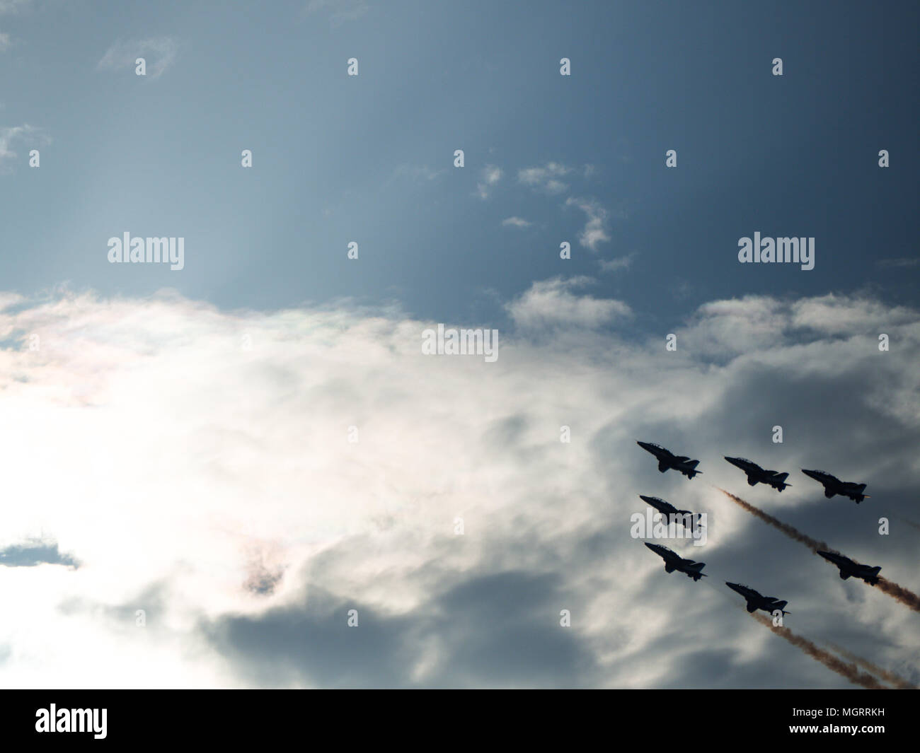 Airplanes in formation during an airshow Stock Photo - Alamy