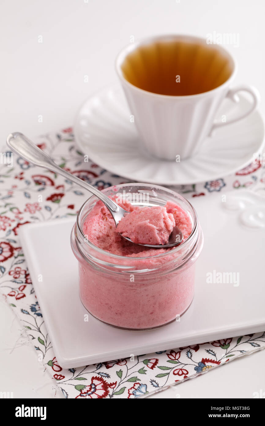 Raspberry agar mousse and tea Stock Photo Alamy