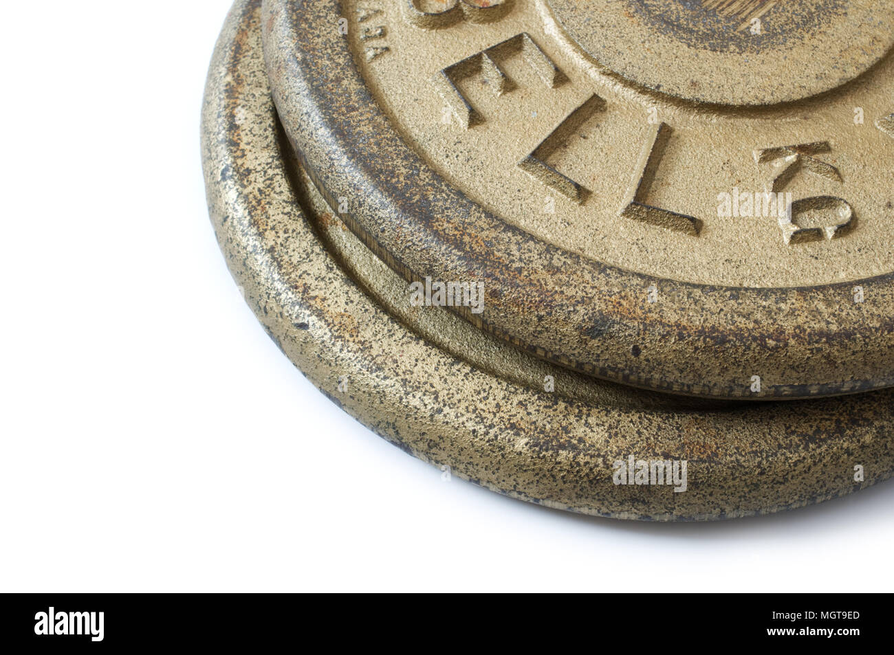 Detail of barbell weights on white background. Stock Photo