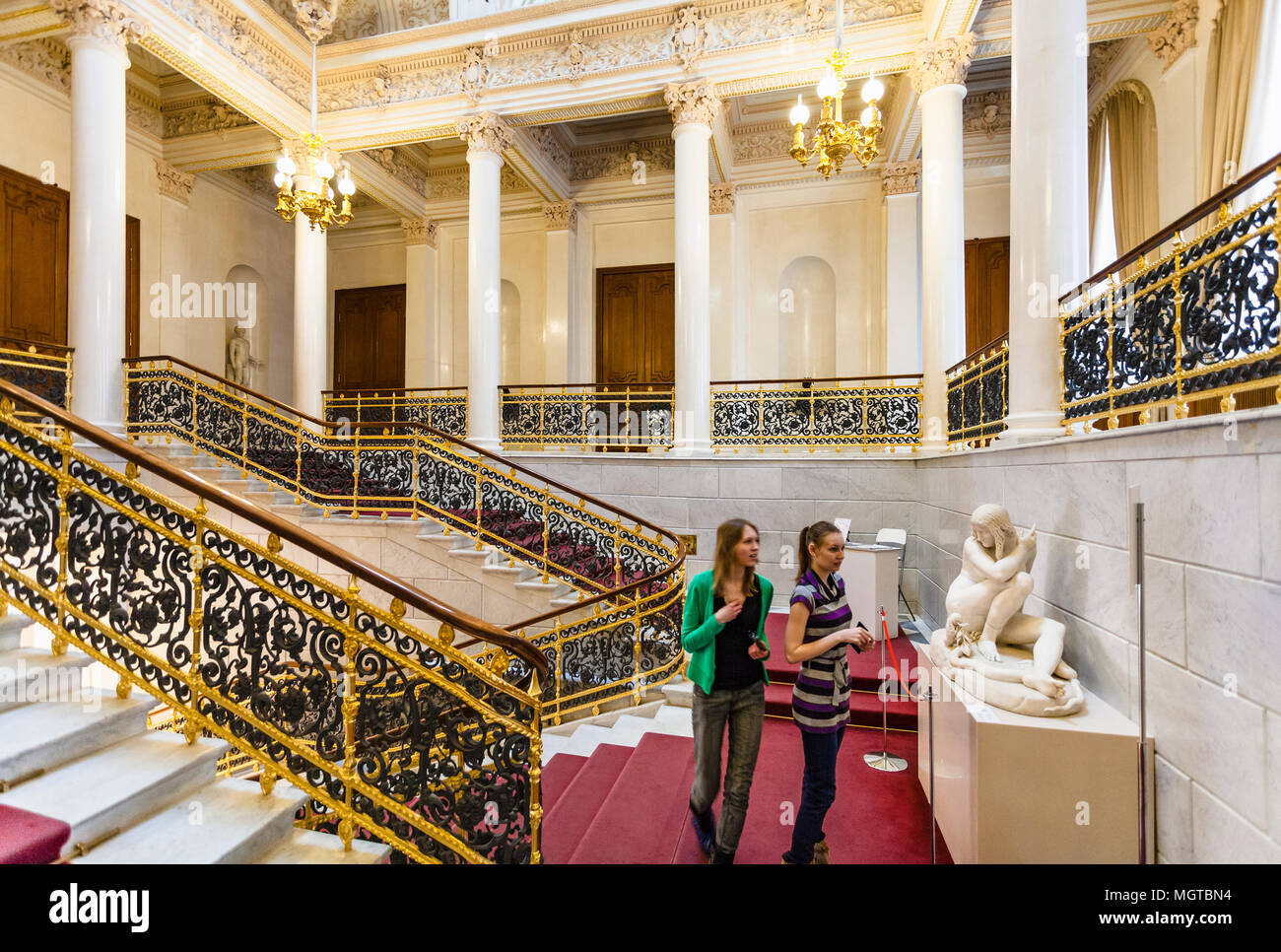 SAINT PETERSBURG, RUSSIA - MARCH 19, 2018: visitors on staircase in Faberge Museum in Shuvalov Palace in Saint Petersburg city. The Palace has housed  Stock Photo
