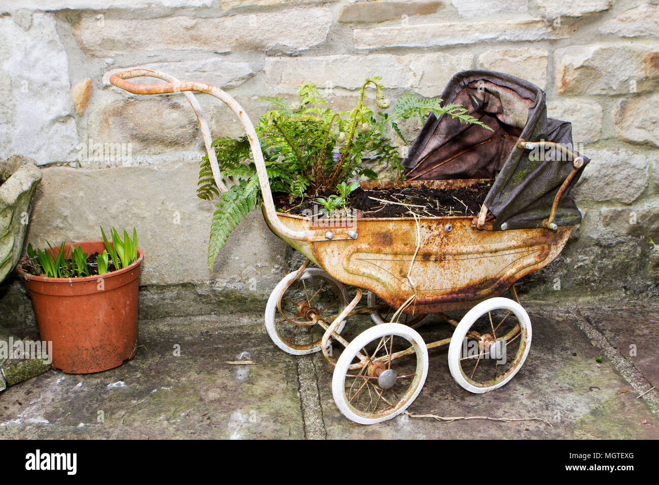 antique metal stroller