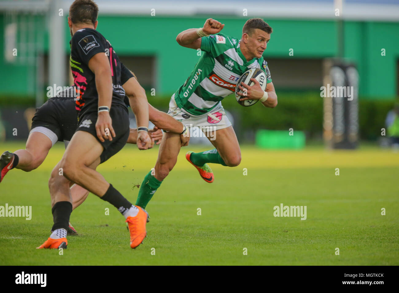Treviso, Italy. 28th April, 2018. Benetton's second centre Tommaso Iannone  breaks a tackle in the match against Zebre Rugby Club in  GuinnessPro14©Massimiliano Carnabuci/Alamy Live news Stock Photo - Alamy
