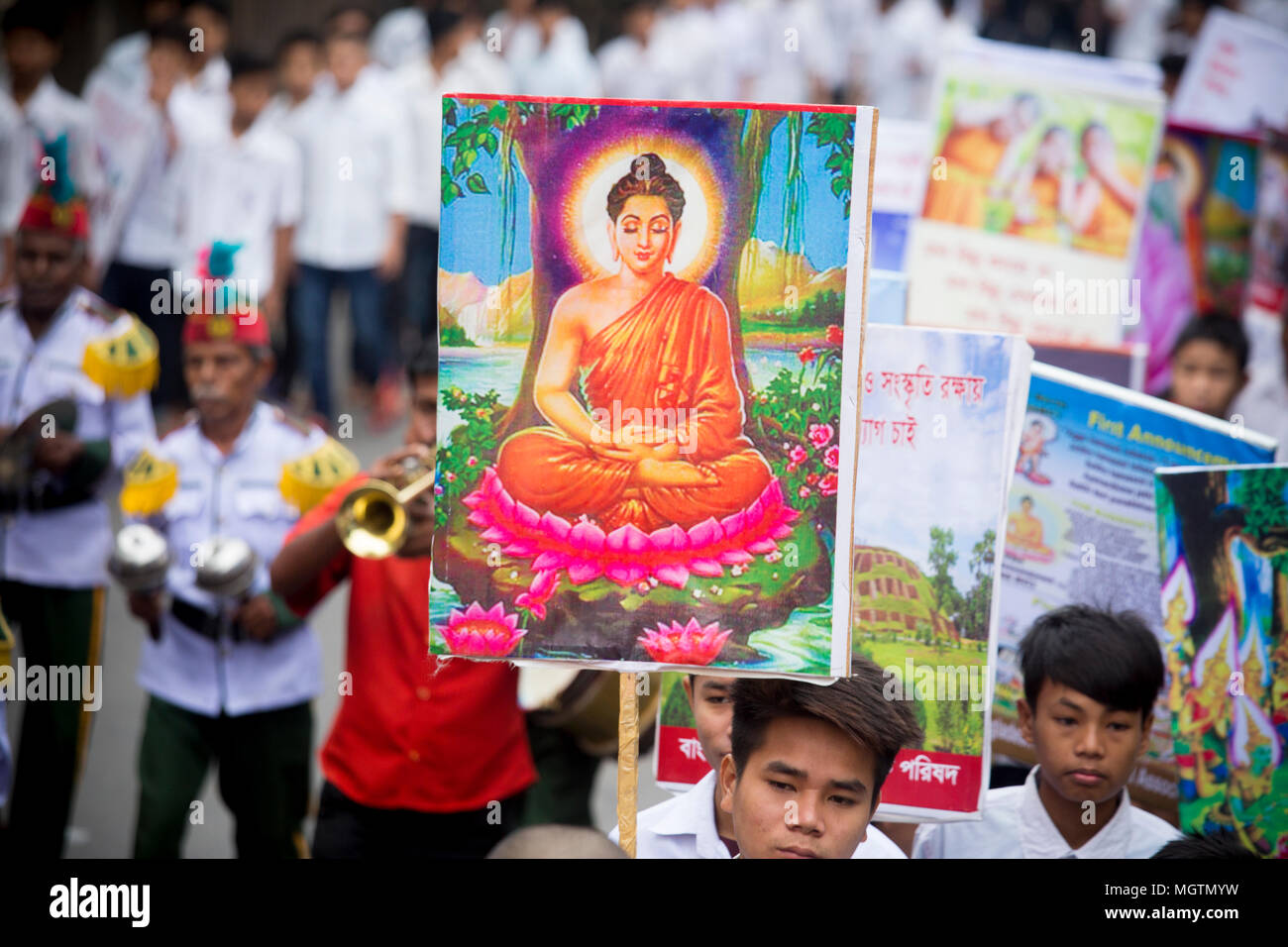 Buddha Jayanti or also known as Buddha Purnima is the biggest religious festival of the Buddhist community; they celebrate Buddha Purnima by performing special worship & light candle paper at the Old part of Dhaka Bashabo Buddhist Temple of Bangladesh. The celebrations started with Rally, lighting of lamps and hoisting of the national and religious flags atop the Mohabihar and chanting of sacred verses from the Tripitaka. Sunday 29 April, 2018. © Jahangir Alam Onuchcha/ Alamy Live News Stock Photo