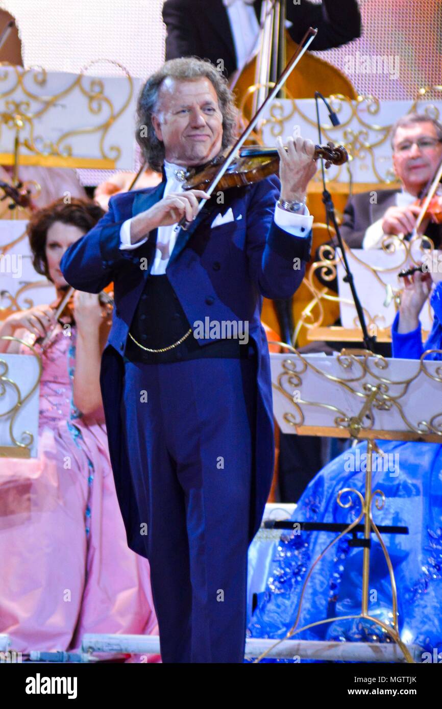 Cologne, Germany. 27th Apr, 2018. Andre Leon Marie Nicolas Rieu Dutch violinist, orchestra leader, at the stage with his Johann Strauss orchestra at the Andre Rieu Tour 2018 concert at the stage Lanxess Arena on Friday, April 27, 2018 in Koeln | usage worldwide Credit: dpa/Alamy Live News Stock Photo
