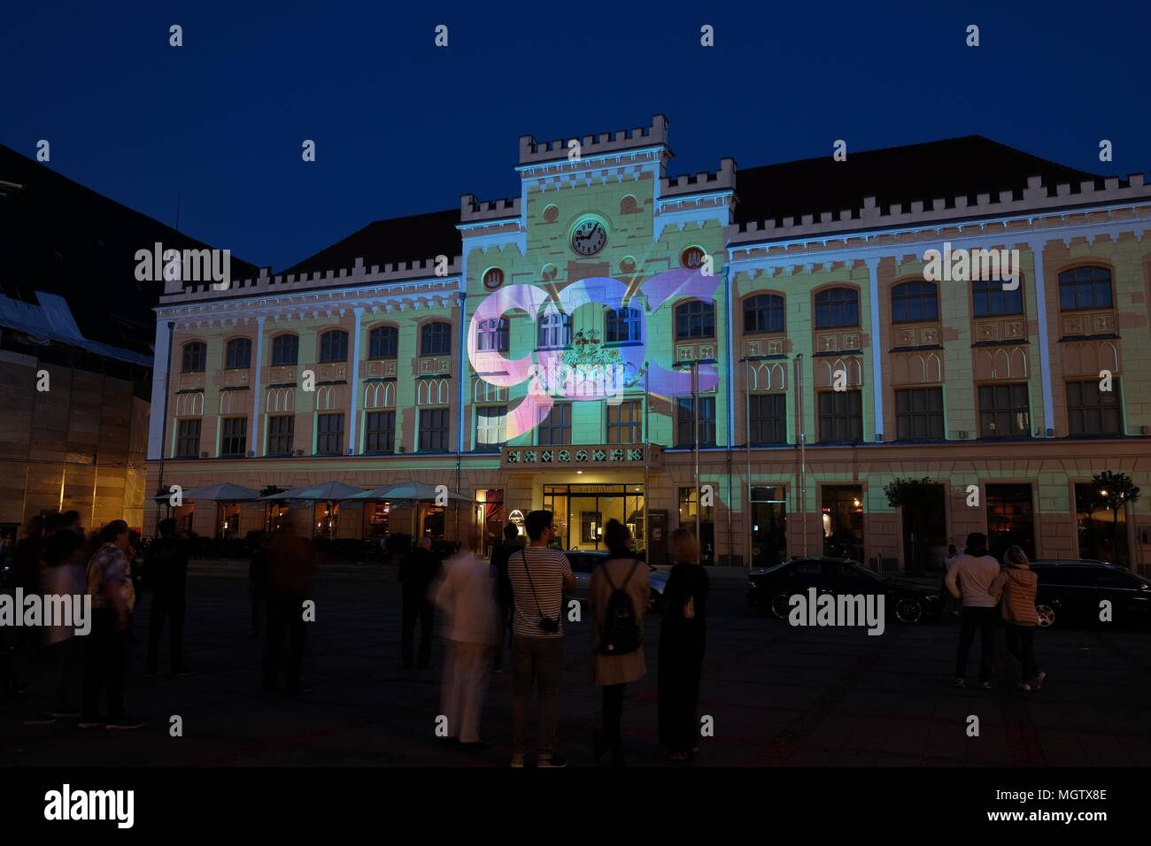 29 April 2018, Germany, Zwickau: Zwickau's town hall is illuminated during a lighting test. A light festival will take place in the city from the 1 May until 5 May 2018 due to its 900th anniversary. Photo: Sebastian Willnow/dpa-Zentralbild/dpa Stock Photo