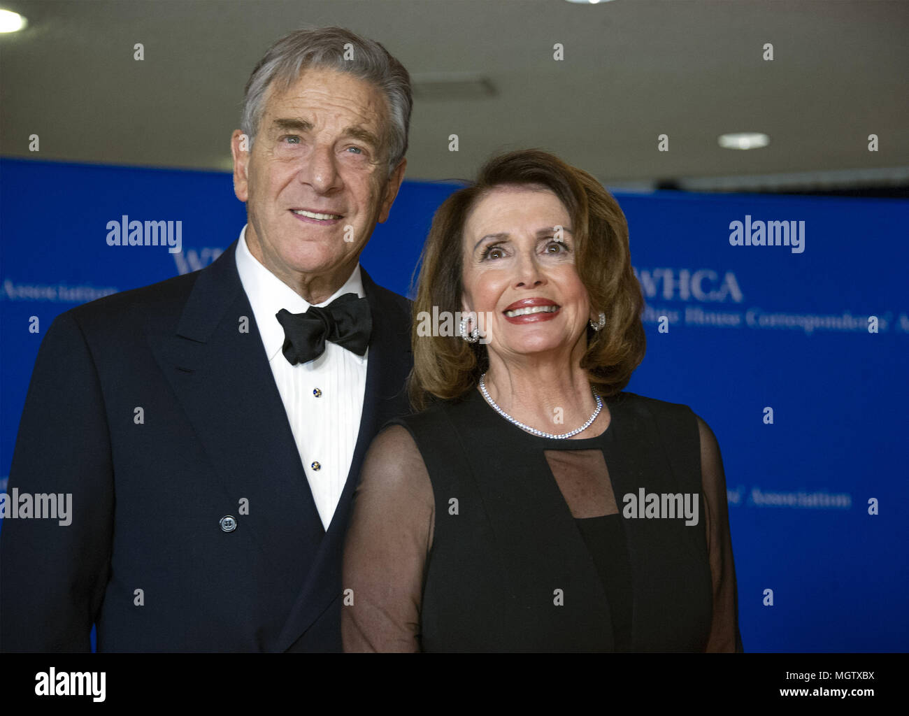 Washington, District of Columbia, USA. 28th Apr, 2018. United States House Minority Leader Nancy Pelosi (Democrat of California), right, and her husband, Paul, left, arrive for the 2018 White House Correspondents Association Annual Dinner at the Washington Hilton Hotel on Saturday, April 28, 2018.Credit: Ron Sachs/CNP. Credit: Ron Sachs/CNP/ZUMA Wire/Alamy Live News Stock Photo