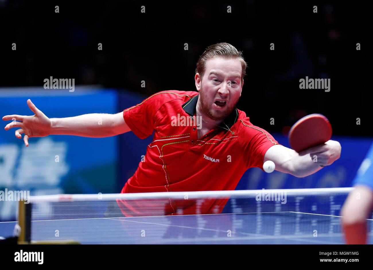 Contractor Abundance Blink Halmstad, Sweden. 29th Apr, 2018. Robin Devos of Belgium returns a ball  against Matsudaira Kenta of Japan at the first round of men's group matches  during 2018 World Team Table Tennis Championships