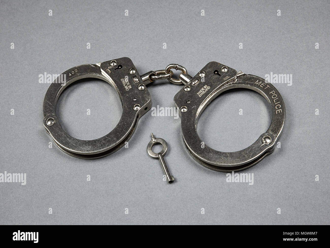 Original Metropolitan Police handcuffs. Stock Photo