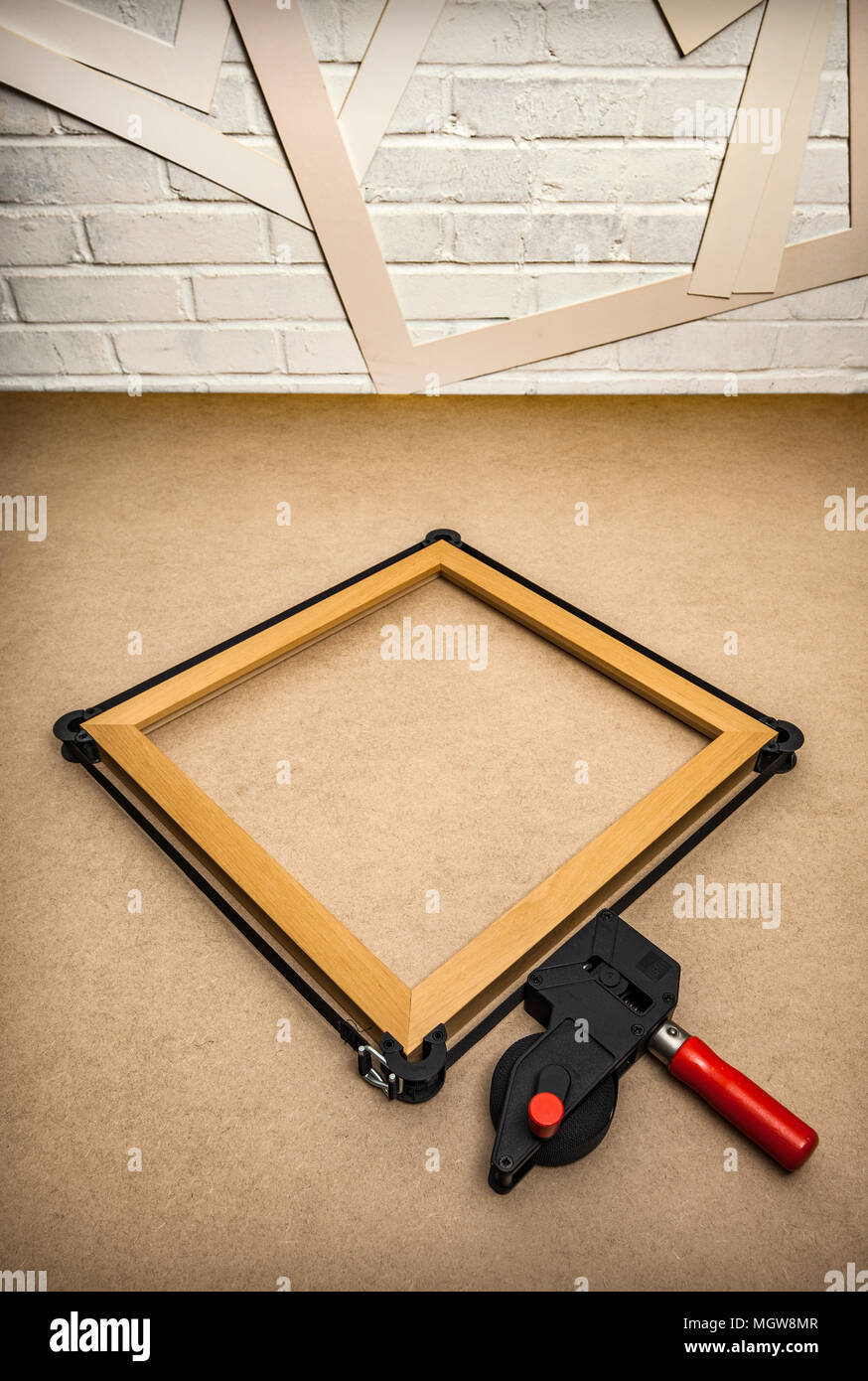 Picture frame being clamped together. Stock Photo
