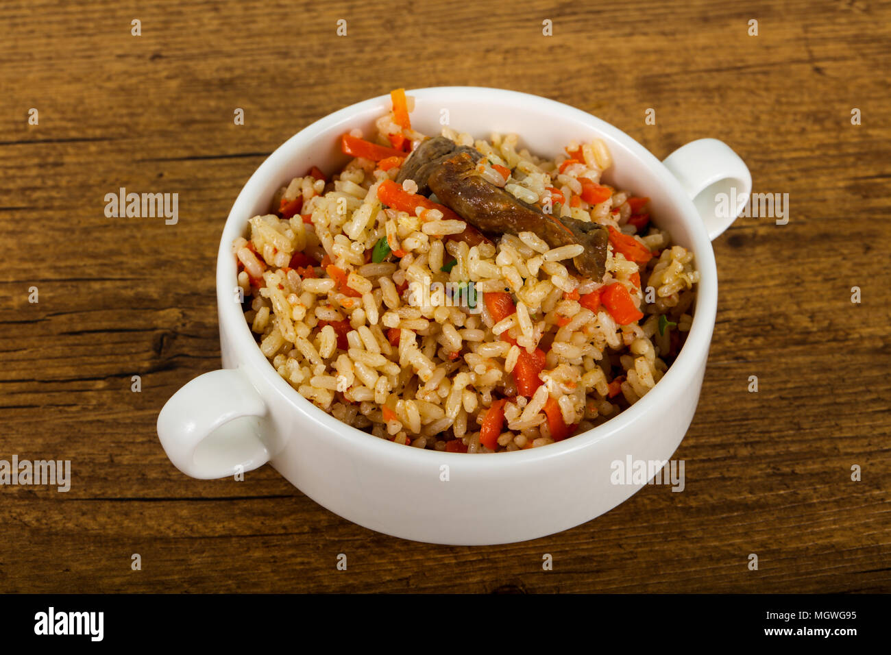 Asian rice - Plov with meat and carrot Stock Photo - Alamy