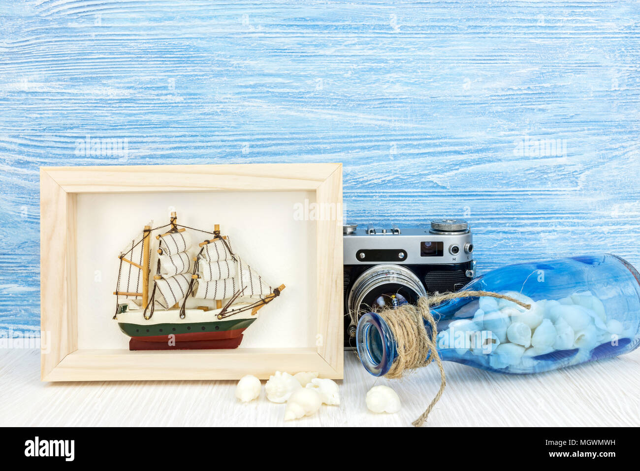 decorative marine items against blue wooden boards. summer vacation concept  Stock Photo