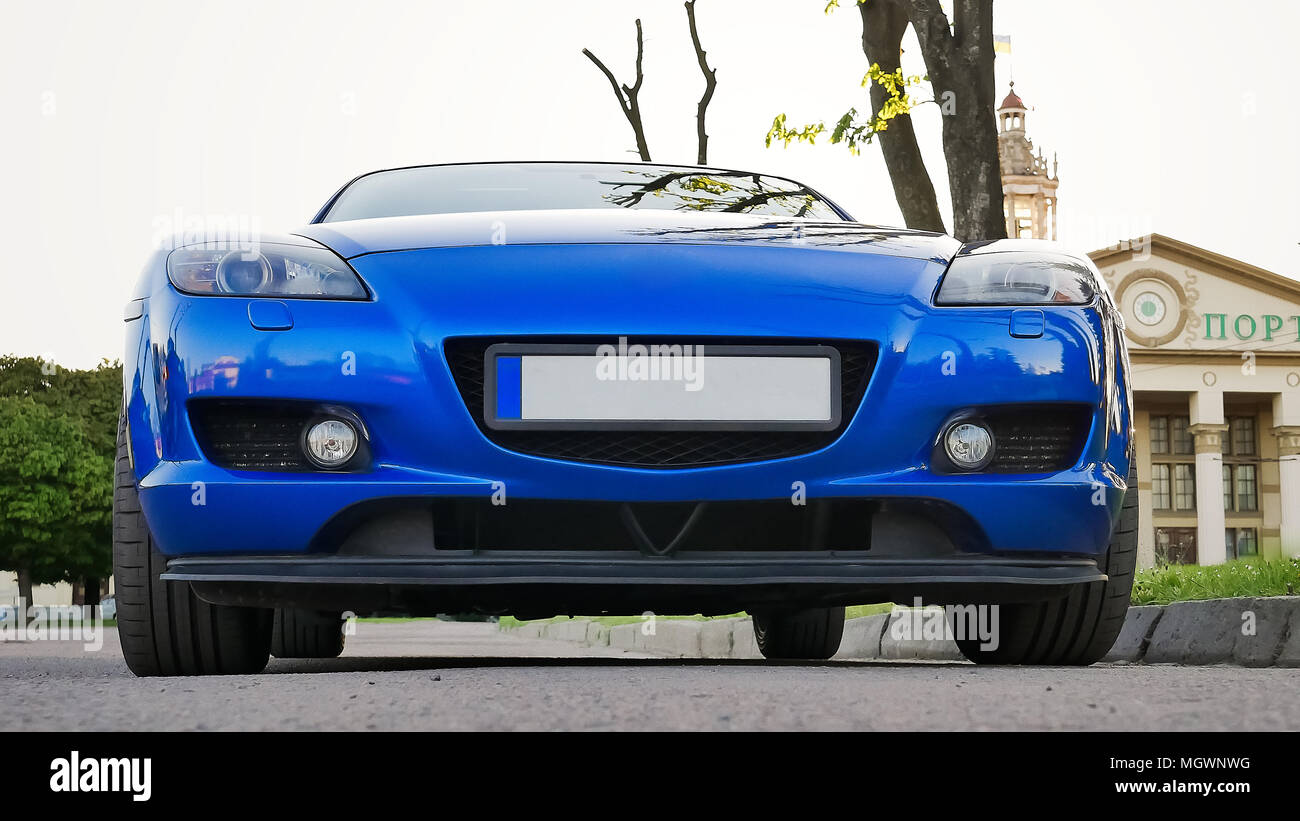Blue luxury car parked hi-res stock photography and images - Alamy