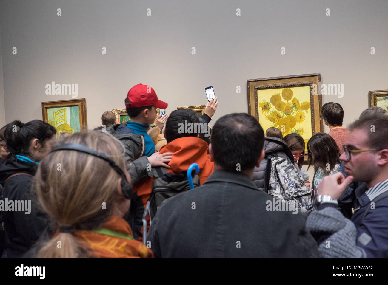 Photographing,mobile,camera,phones,Vincent,Van Gogh,Sunflowers,painting,National Gallery,Trafalgar Square,London,England,Great Britain,GB,U.K.,UK, Stock Photo
