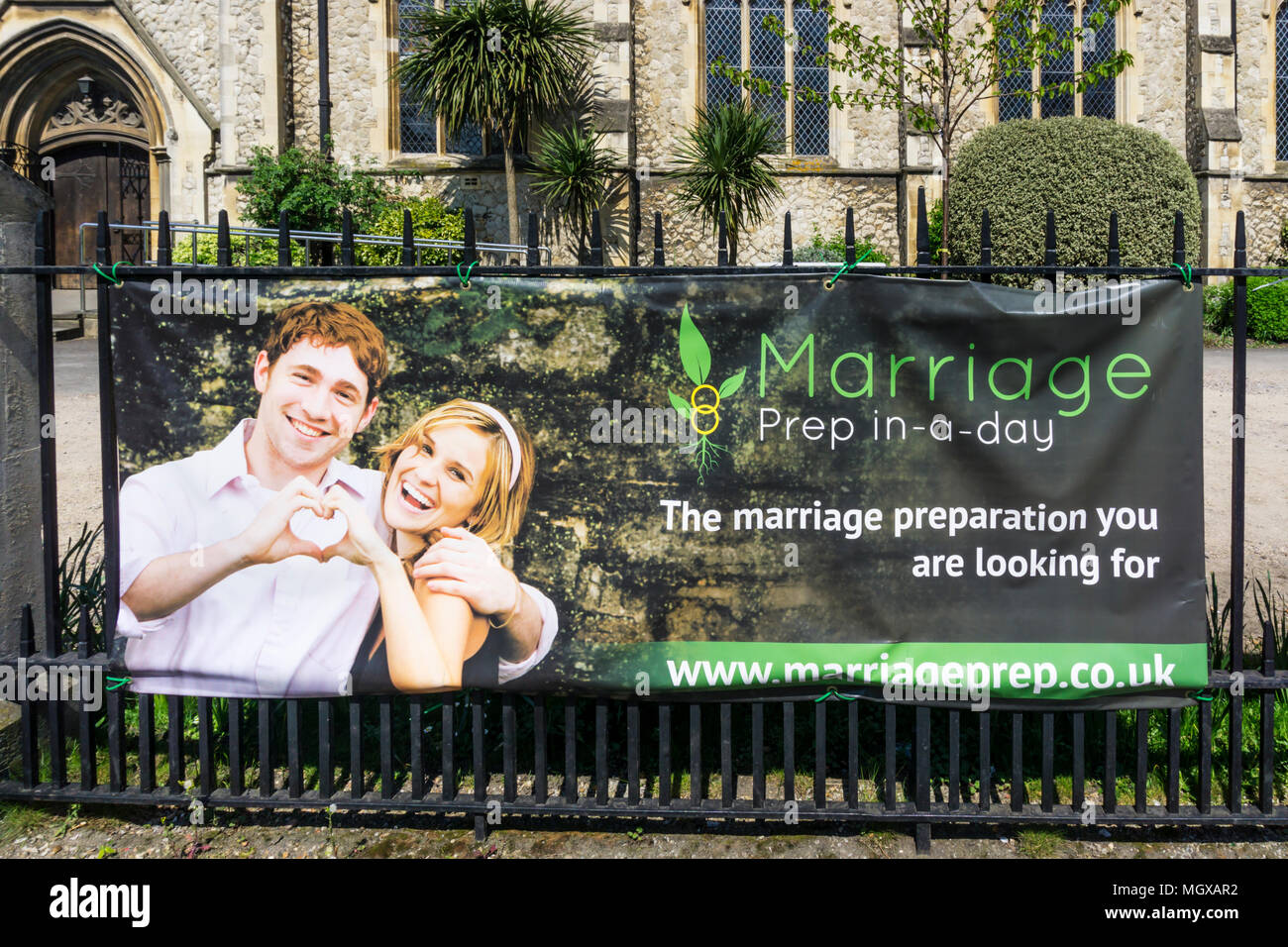 A sign for marriage preparation courses outside a south London church. Stock Photo