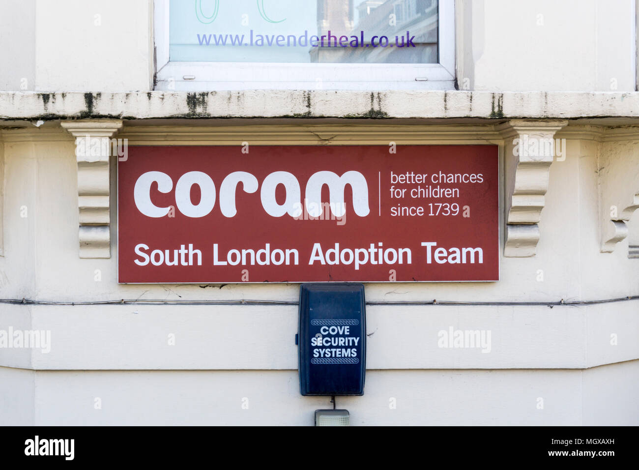Sign on the premises of the Coram South London Adoption Team. Stock Photo