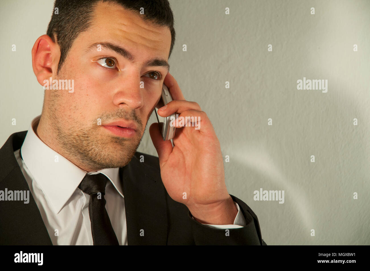 Businessman using mobile phone. Stock Photo