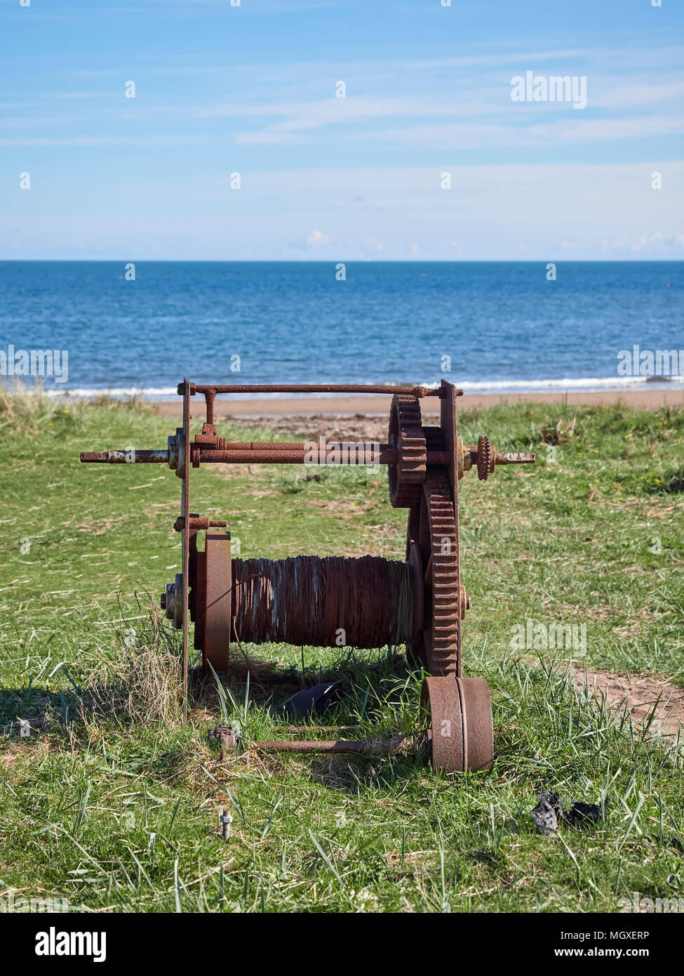 The bow of a traditional Greek fishing boat, showing the hand winch used  for hauling nets Stock Photo - Alamy