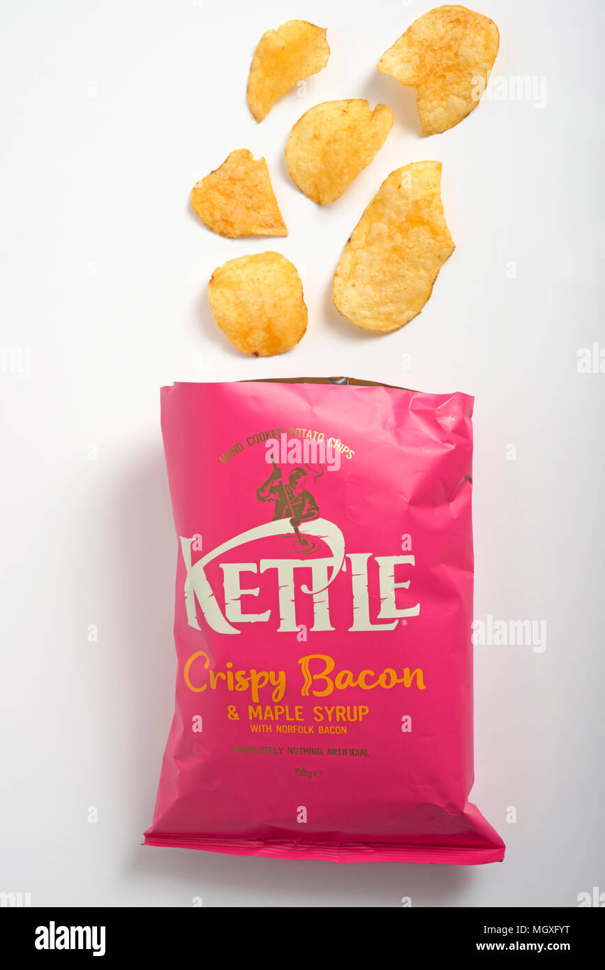 Kettle crispy bacon and maple syrup crisps Stock Photo