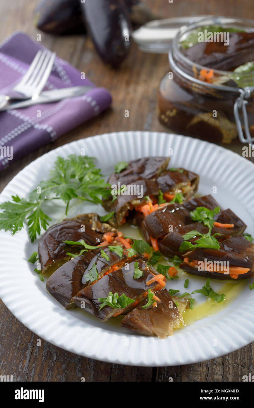 Marinated eggplant stuffed with carrot Stock Photo