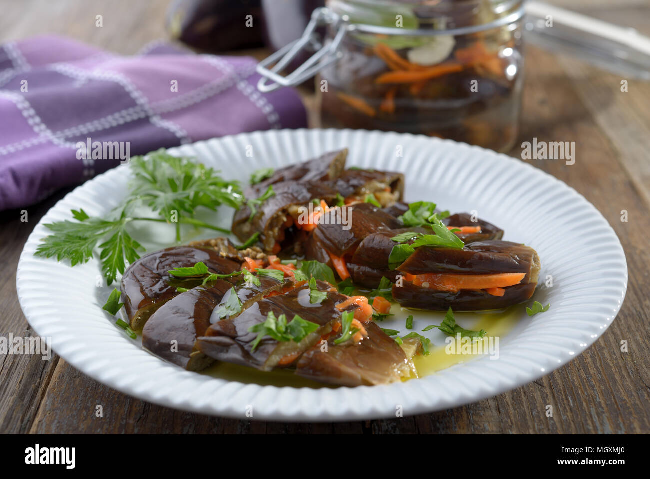 Marinated eggplant stuffed with carrot Stock Photo