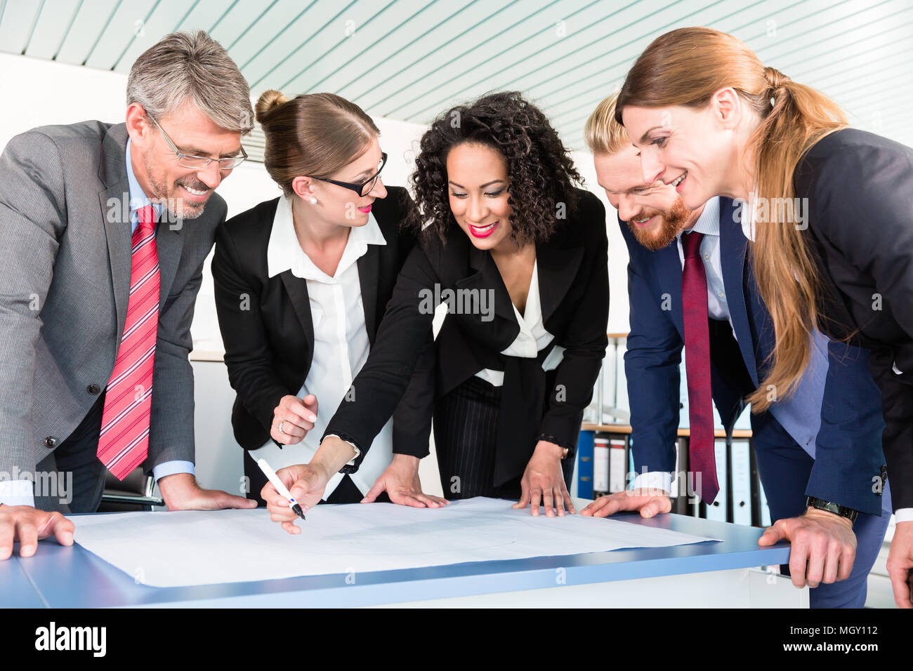 Group of business people analyzing data Stock Photo