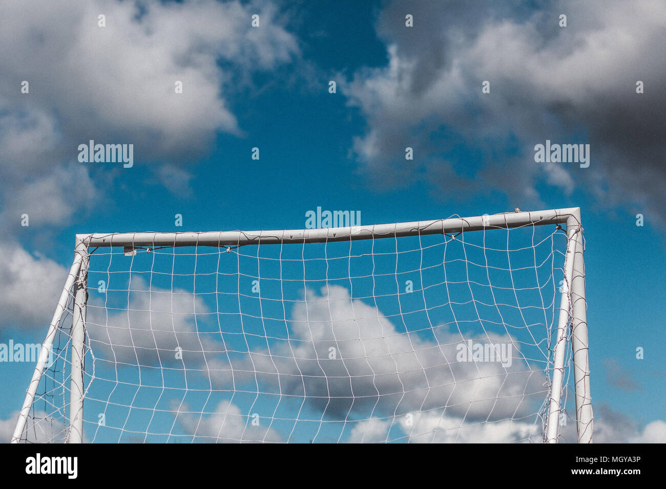 Close Up Of A Football Goal Post With A Cloudy And Blue Sky In The Background Stock Photo Alamy
