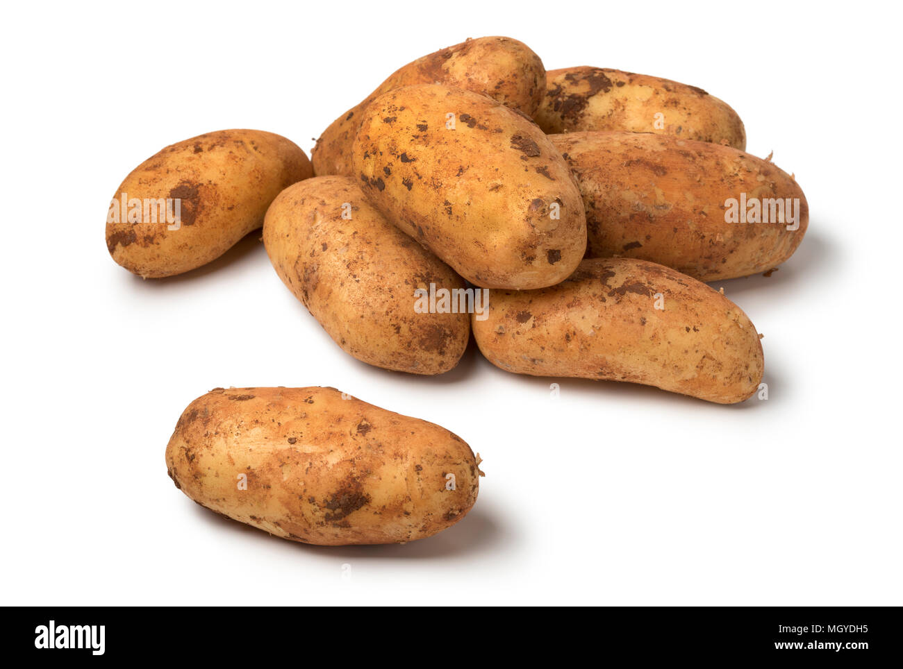Fresh picked raw whole Diamant potatoes from Cyprus isolated on white background Stock Photo