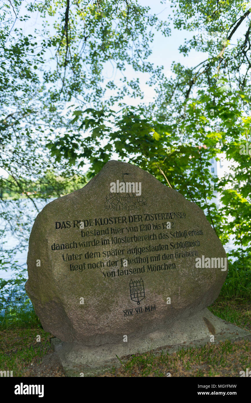 Memorial stone at the moat of Castle Gluecksburg, commemorating the former site of Glücksburg Abbey, Glücksburg, Schleswig-Holstein, Germany, Europe Stock Photo
