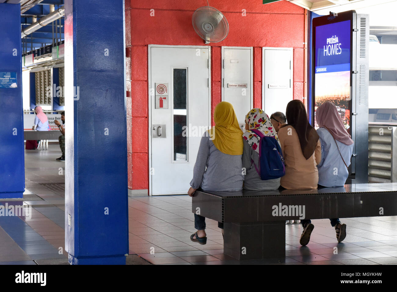 Women at Subway station, Kuala Lumpur Stock Photo