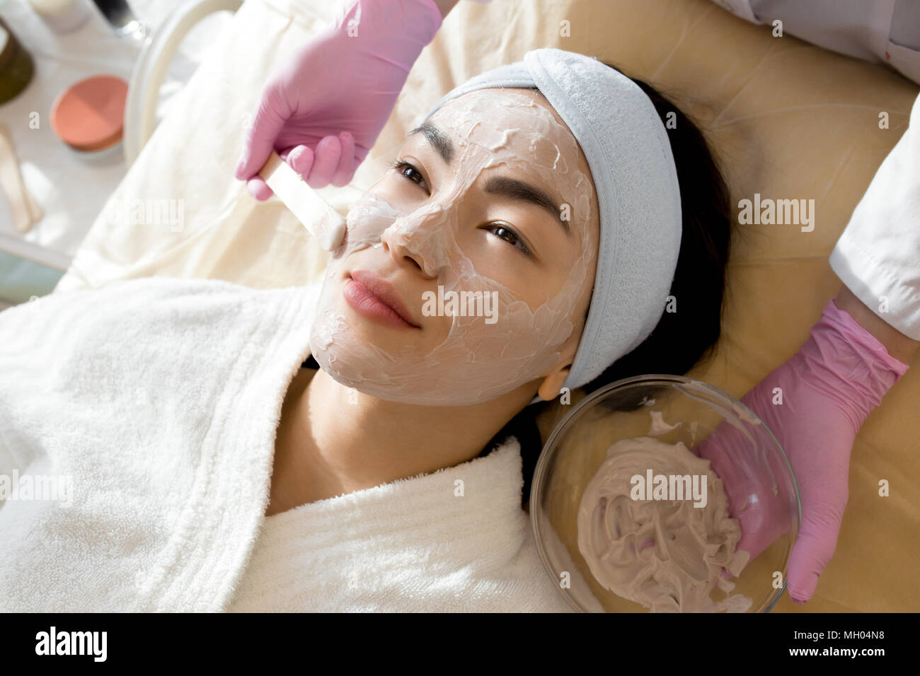 Woman enjoying beauty treatment hi-res stock photography and images - Alamy