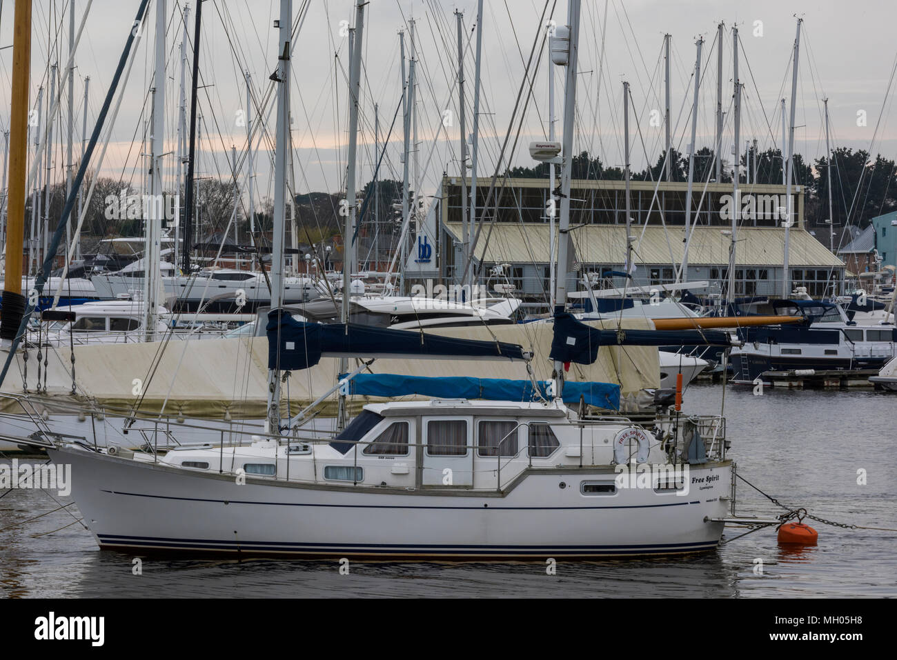 a large motor yacht berthed on a pontoon at berthons marina on the