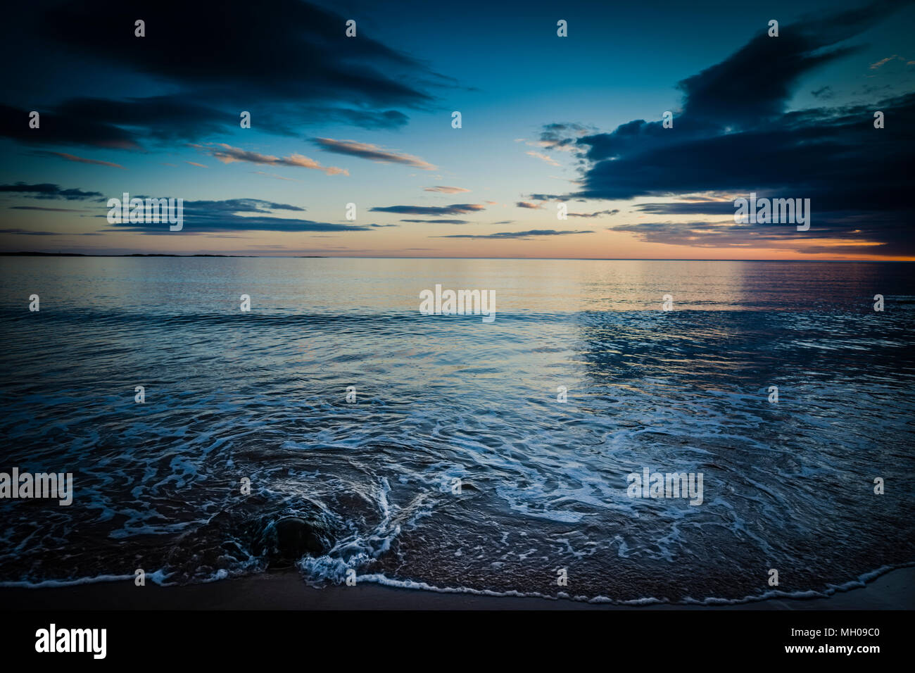 Sunrise over the North Sea, Northumberland, UK Stock Photo - Alamy