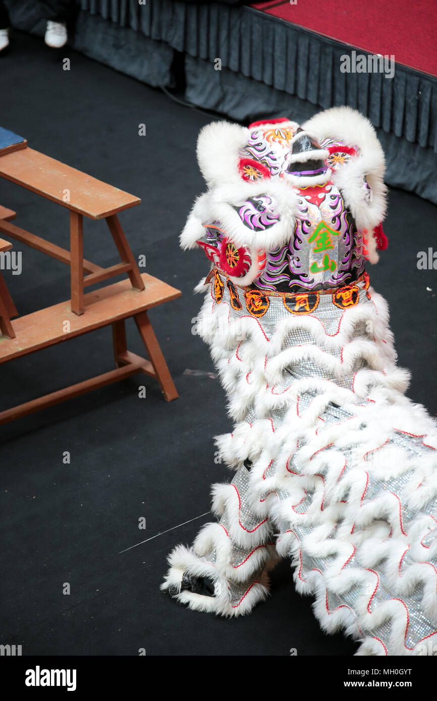 White color lion dance performing at VIVA HOME shopping mall in Kuala