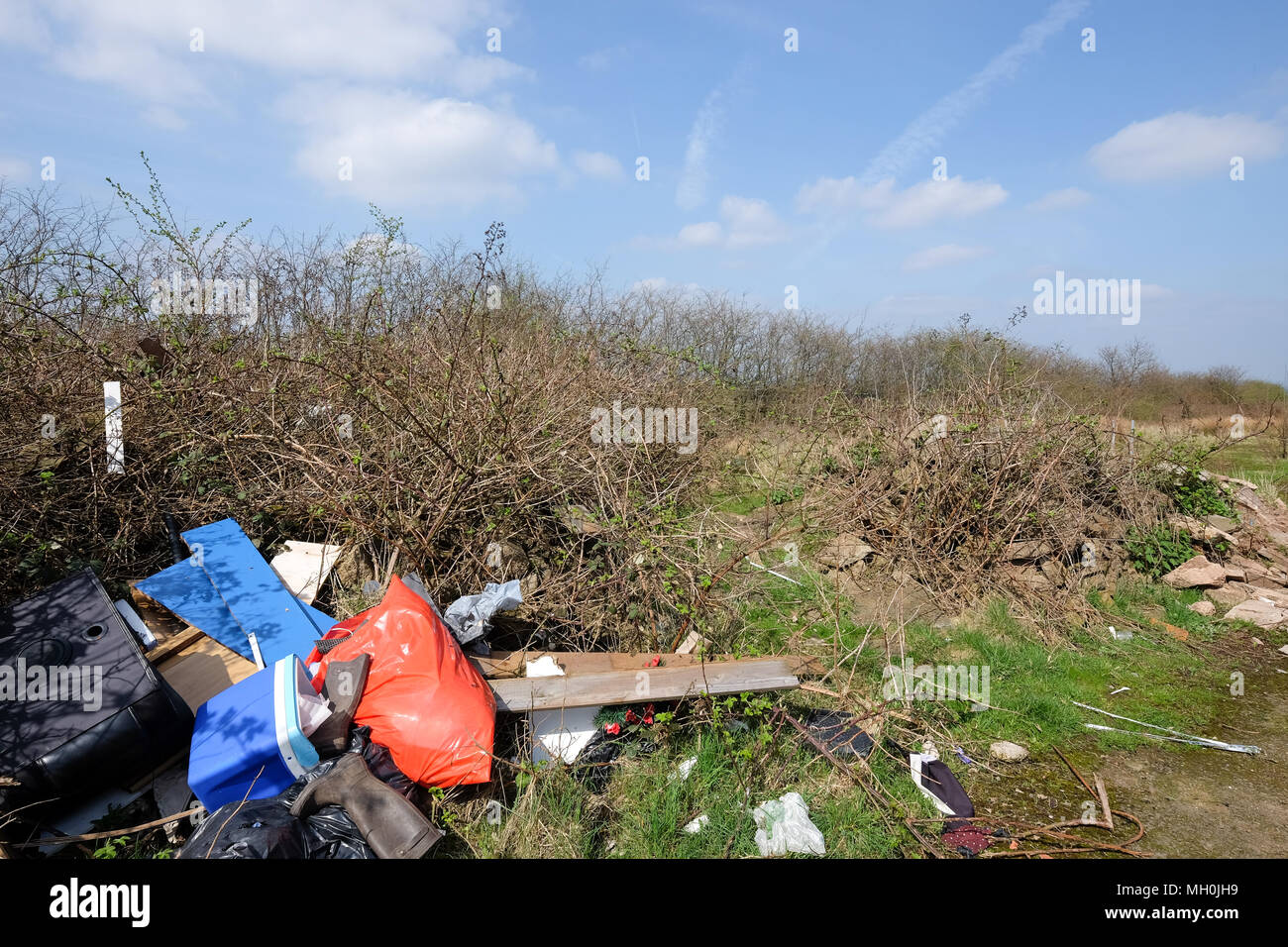 rubbish dumped in a field Stock Photo Alamy