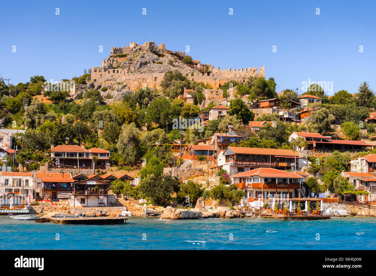 Kalekoy village (Simena) with the Byzantine castle in the center ...