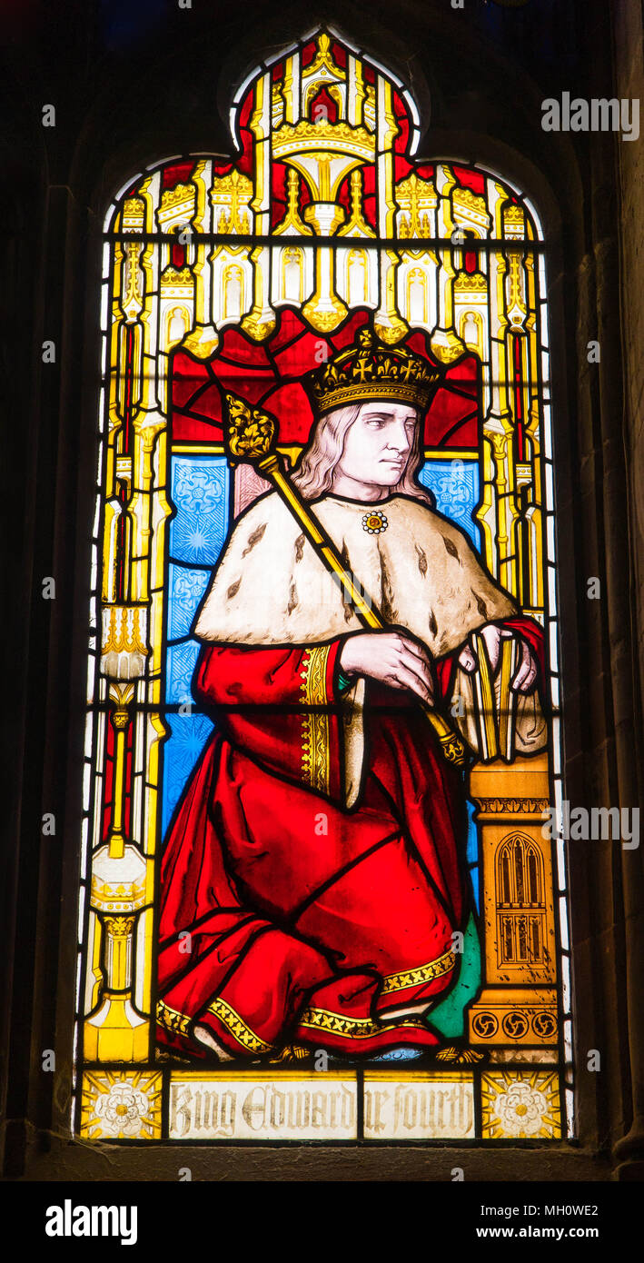 Stained glass depicting King Edward the Fourth with crow and scepter. St Laurence's church Ludlow Shropshire UK. April 2018 Stock Photo